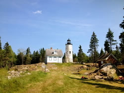 Baker Island lighthouse area after trees were removed. The open appearance of the area is similar to the open character of 1937.