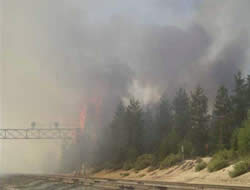 Fire hitting the western railroad right-of-way.