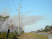 Smoke rising over Highway 98