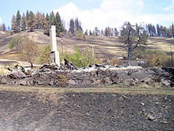 A structure destroyed by the Poe Cabin fire.