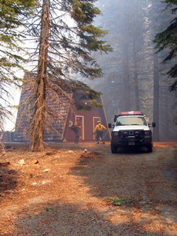 Firefighters and engine protecting the amphitheater.