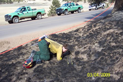 Fire investigator collecting evidence.