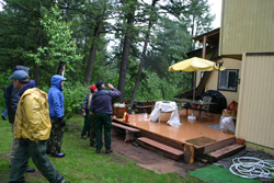 Firefighters assess a home for one of the homeowner participants at All Fire Day.