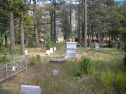 Fort Yellowstone Cemetery after vegetation management and grave stabilization.