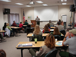 Mike Adams welcomes participants to the fire interpretation workshop.