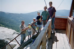 Visitors on Buck Rock Lookout's steps.