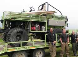 Big Cypress firefighters Bela Harrington, Adam Kunce and Chris Richards with the old equipment.