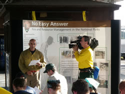 Burn boss trainee Robert Trincado conducts the pre-burn briefing and safety briefing.