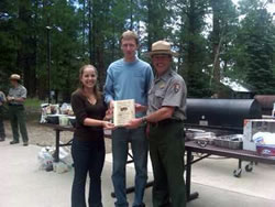 Jennifer and Jasper Peach receive NPS Intermountain Region fire ecology award from Superintendent Dave Uberuaga.