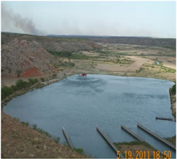 Fire crews and engines engaged in burning operations of the grasslands of Grant-Kohrs Ranch.