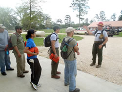 Big Thicket fire staff preparing cadets for deployment of practice fire shelters.