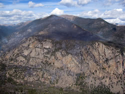 An aerial view of the Fern Lake Fire shows the steep, rugged terrain in the Big Thompson drainage..